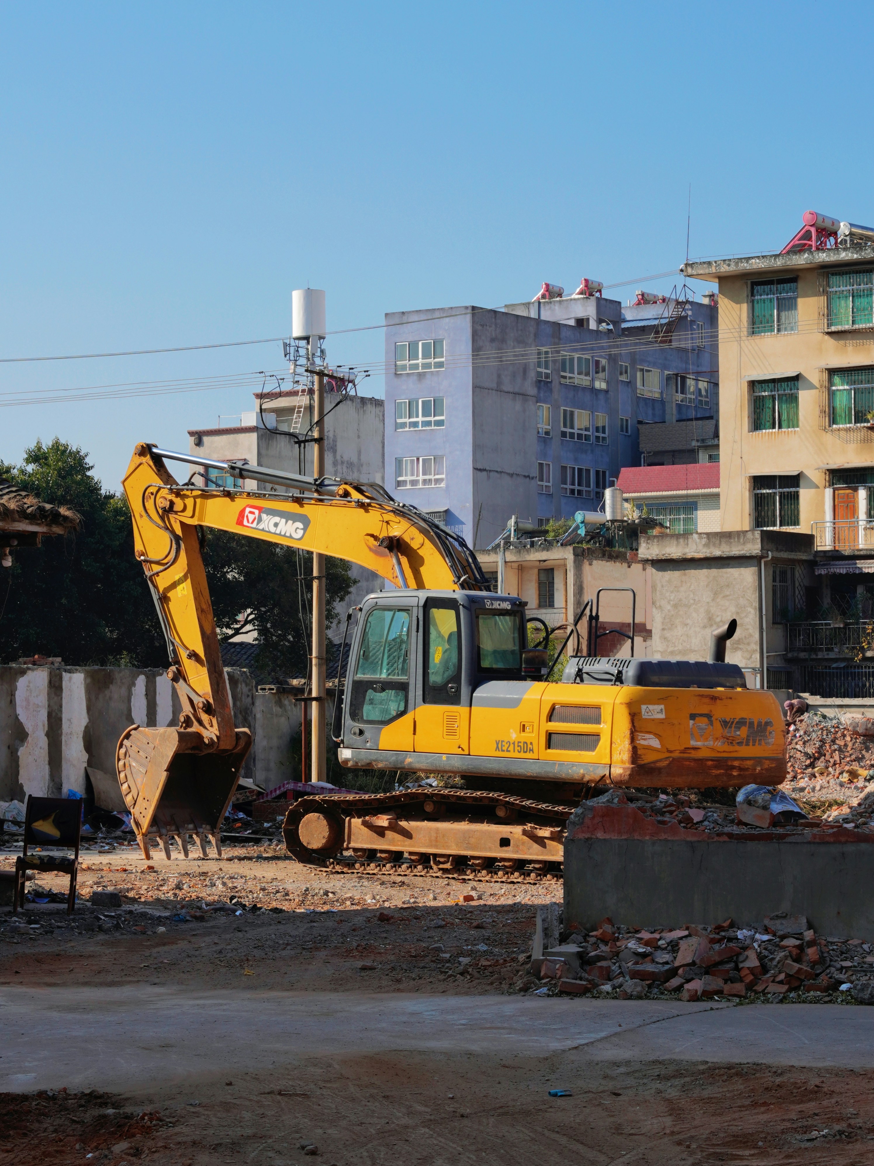 Demolition contractor equipment and site